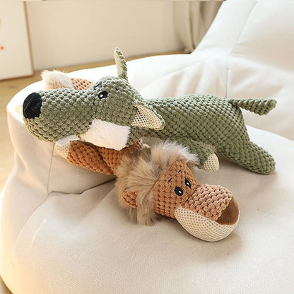 Knitted fox toy on a white surface