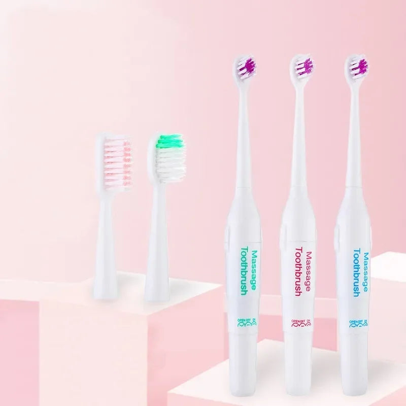 Set of four white toothbrushes with colorful bristle heads on a pink background
