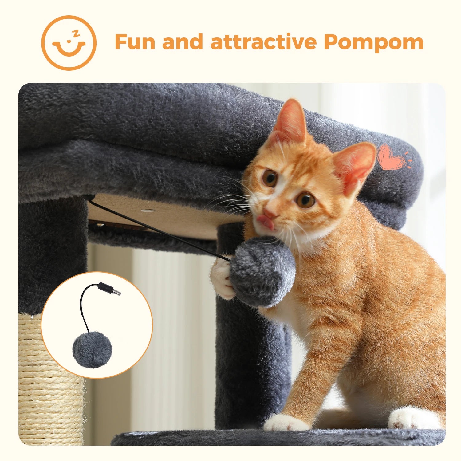Cat playing with a pom-pom toy attached to a cat tree
