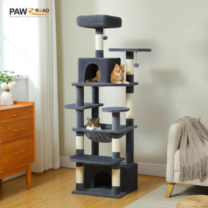 Cat tree with multiple levels and a cat sitting on top in a room setting.